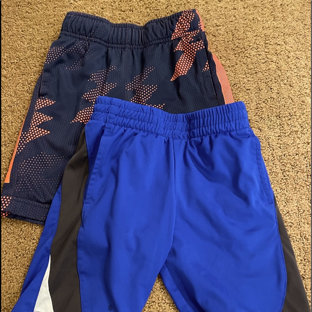 Two pairs of boys athletic shorts in good condition.